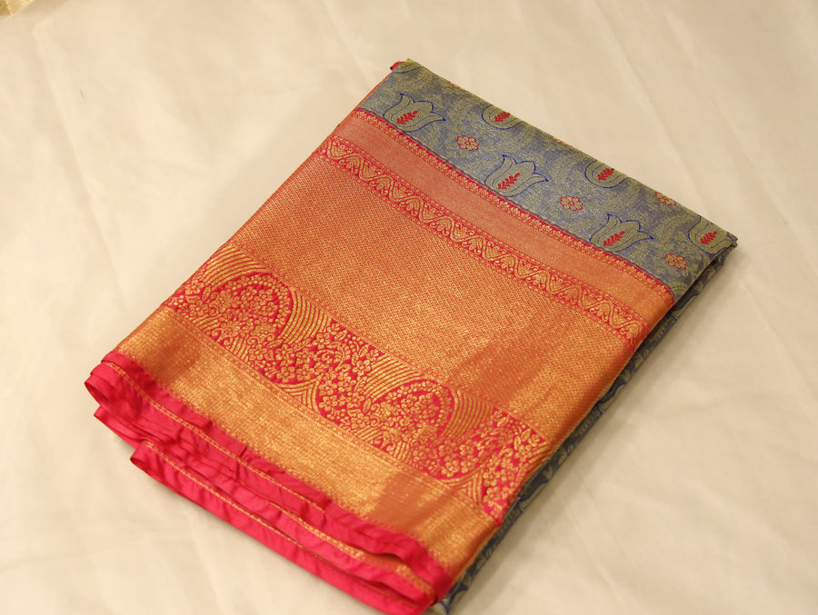 Saffron Yellow Kanchipuram Inspired Semi Silk Saree with Medium Medium Contrast Border