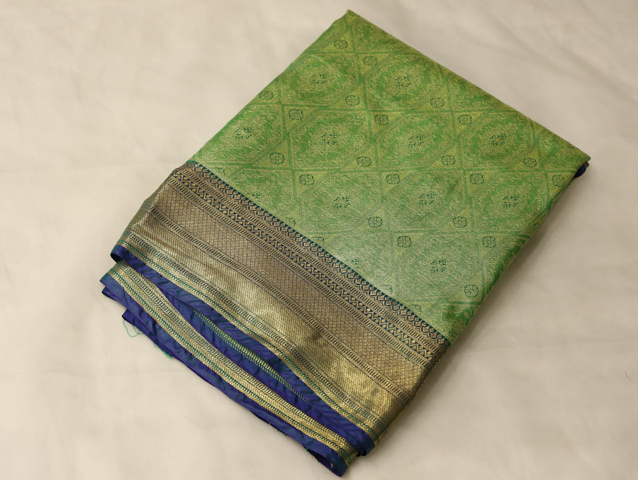 Spring Leaf Green Kanchipuram Inspired Semi Silk Saree with Wide Wide Contrast Border