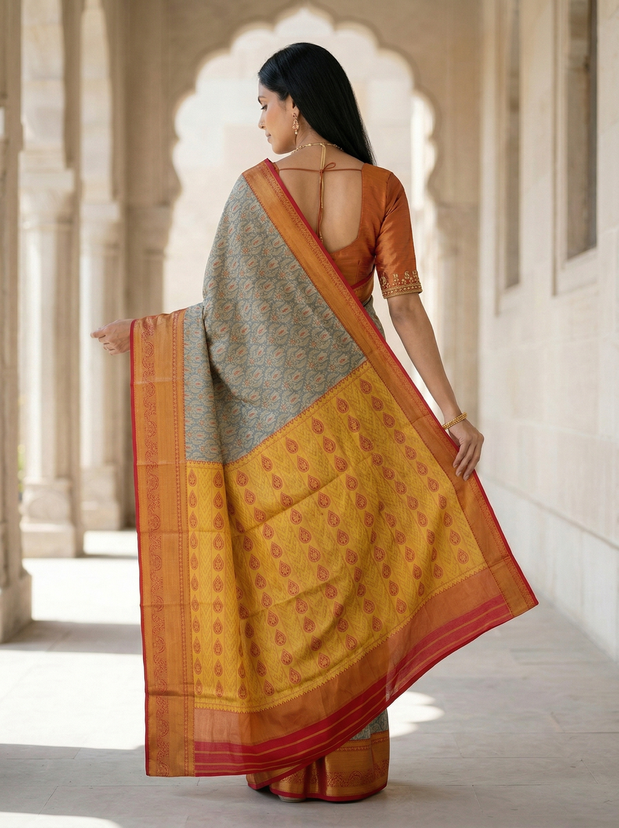 Saffron Yellow Kanchipuram Inspired Semi Silk Saree with Medium Medium Contrast Border