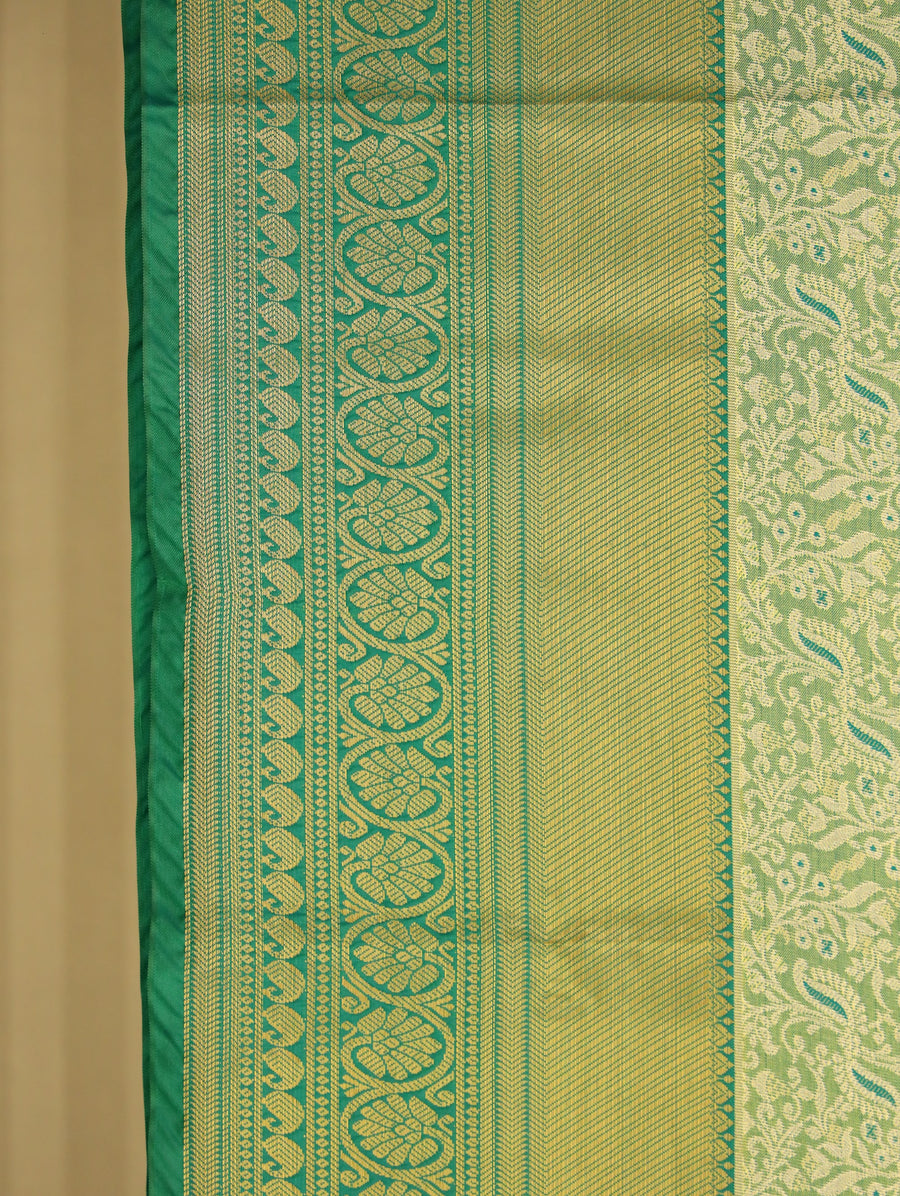 Emerald Green Kanchipuram Inspired Semi Silk Saree with Medium Medium Self Border